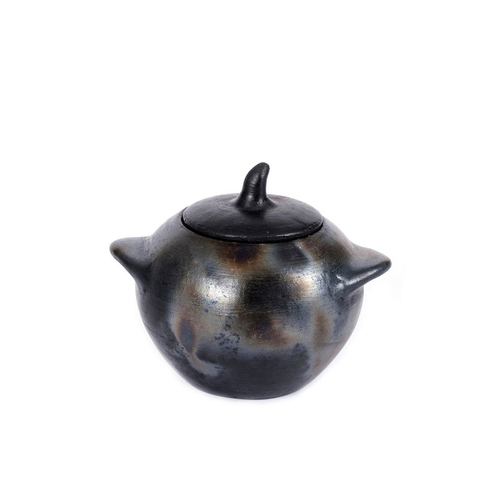 De verbrande pot - M